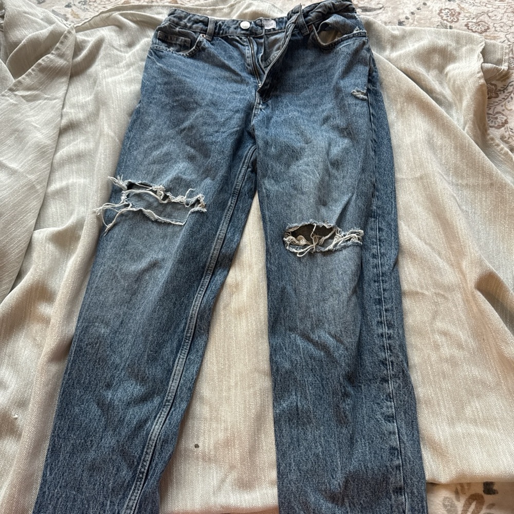 Distressed Blue Jeans